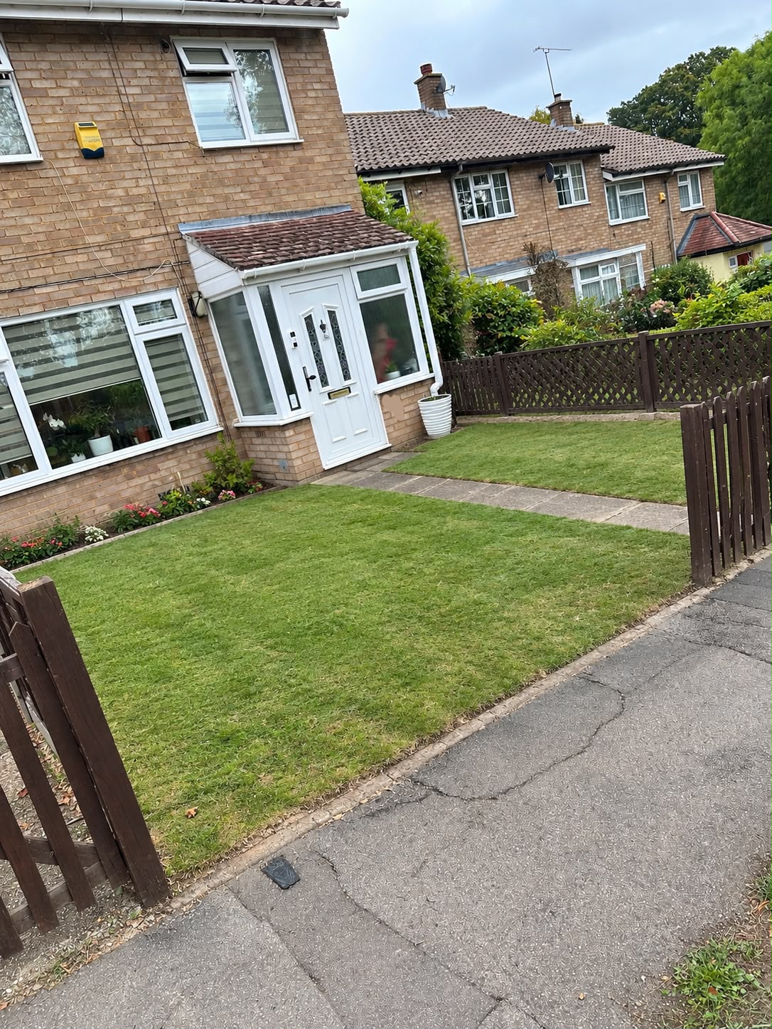 After: front garden hedge removed and new turf laid